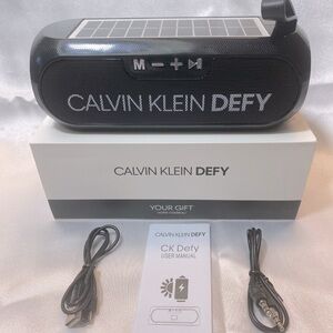 Calvin Klein Defy Solar Bluetooth Speaker, Portable Wireless, Black, Boxed-NEW